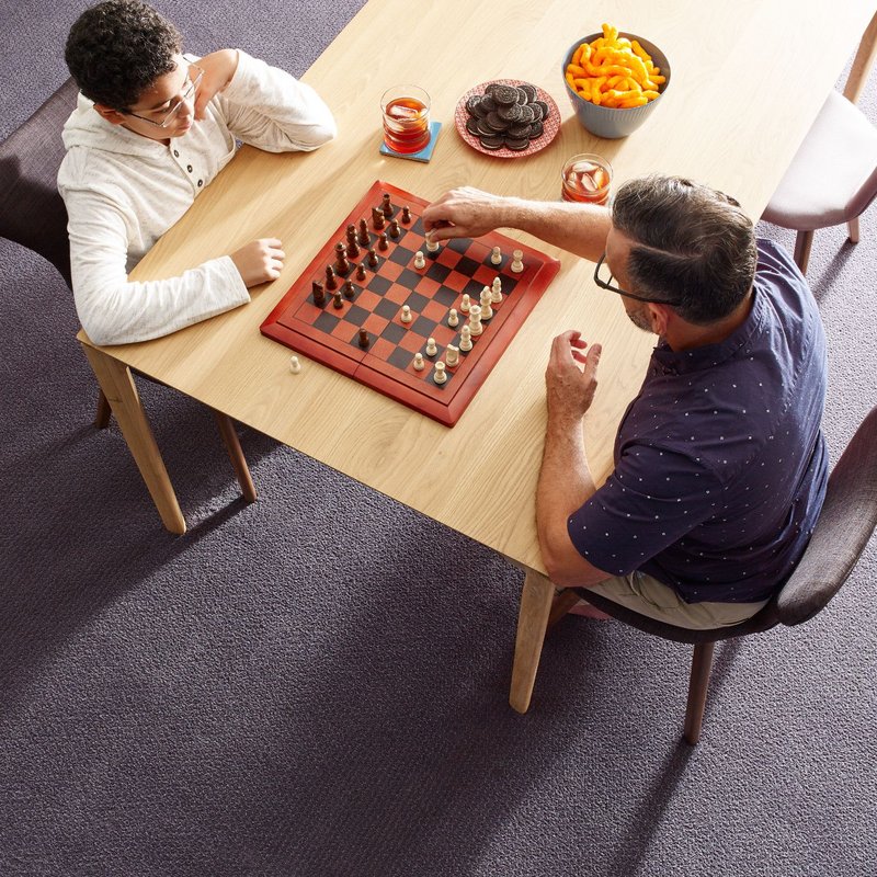 Playing chess - EZ Floors Inc in Houston, TX