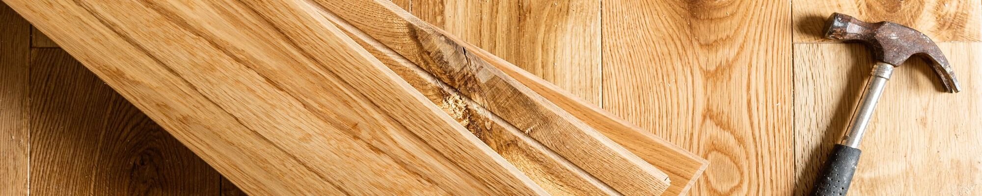 Planks and hammer from EZ Floors Inc in Houston, TX